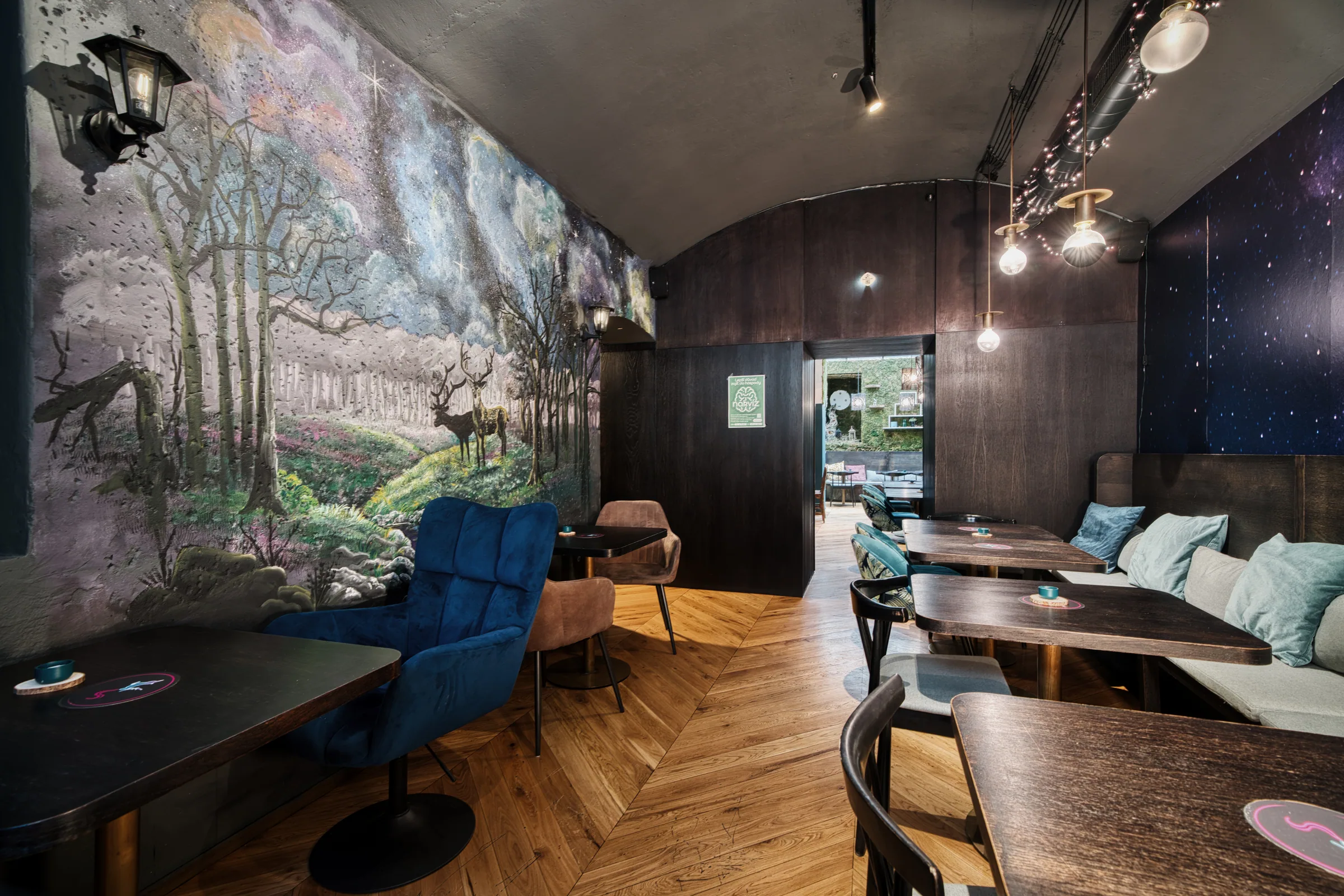Painted mural with a blue armchair